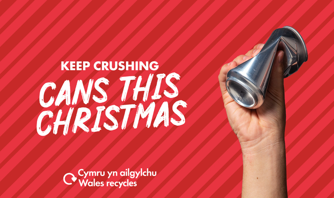 White hand crushing a drinks can with the slogan